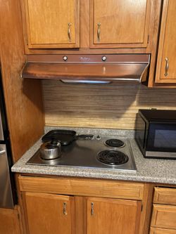 Wide Hood And Electric stove Top