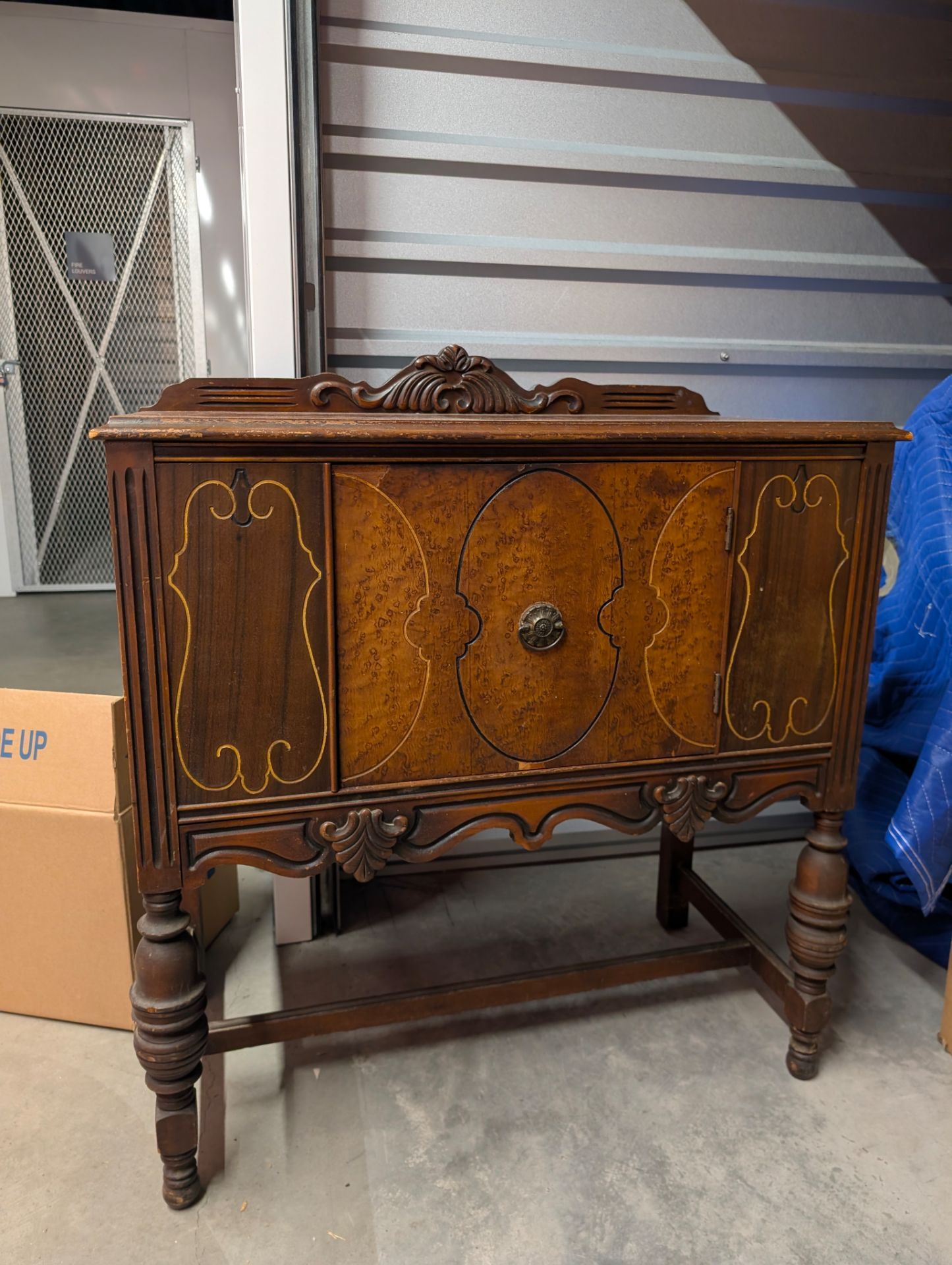 Vintage buffet cabinet with decorative inlay