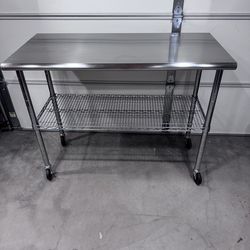 Utility cart with Stainless steel top.