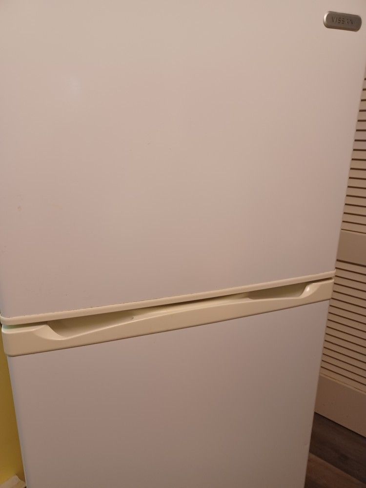 24 Wide X  55 tall.  Refrigerator Excellent Condition 