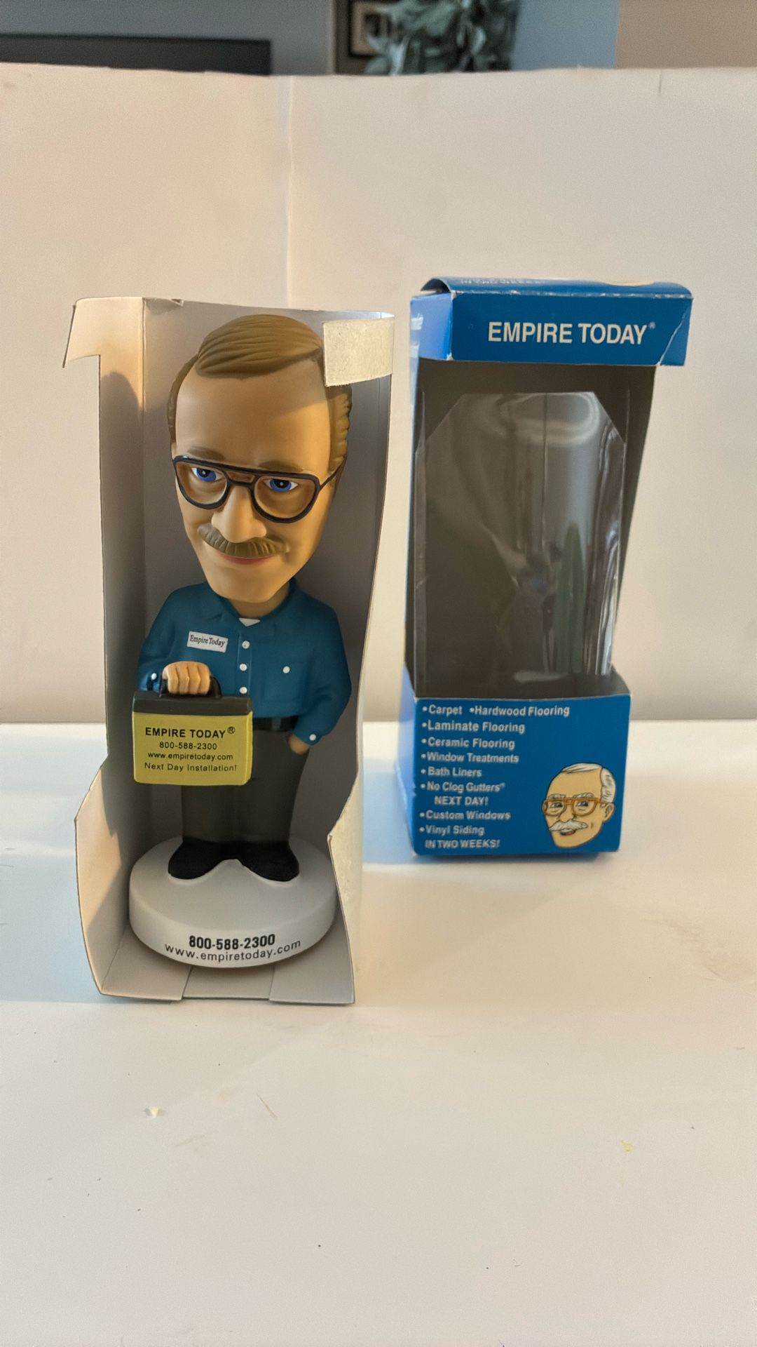 Empire Carpet Bobble head