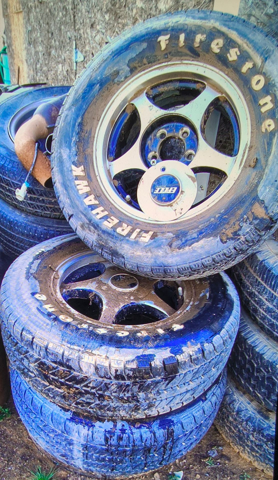 2 sets of rims with tires
