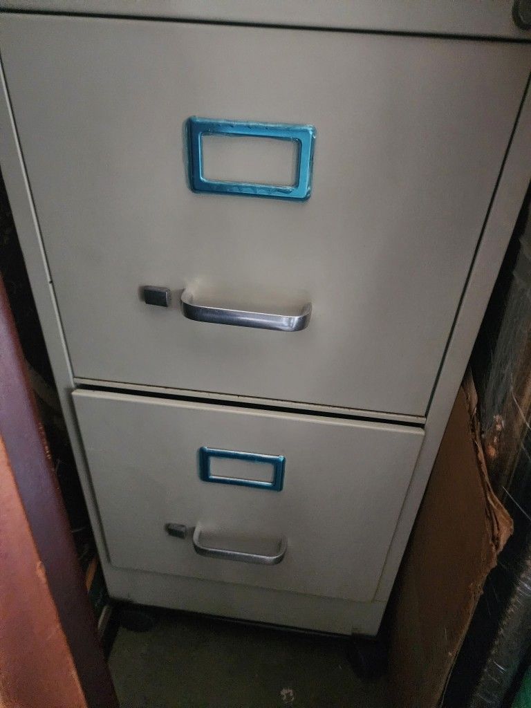Vertical Gray Metal Filing Cabinet