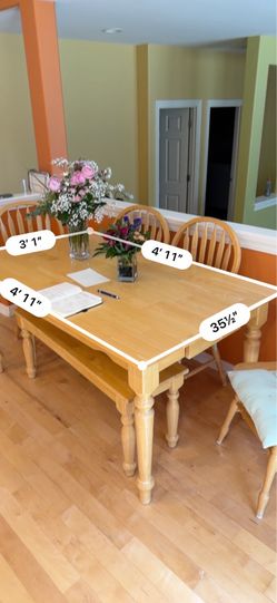 Kitchen table with chairs and bench