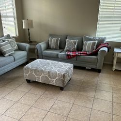 Livingroom Set Matching Couch with hideaway bed, Loveseat, two end tables, ottoman, and two lamps!