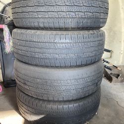 Toyota Tundra stock rims and tires. Comes With A Set Of Brand New Snow Chains