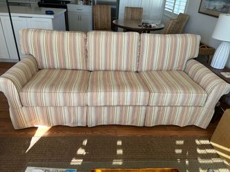 Sofa, Crate & Barrel slip covered couch.