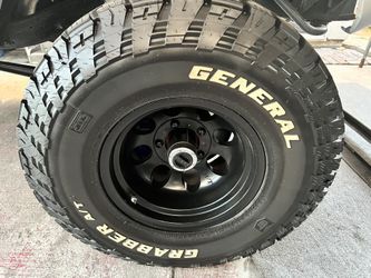 Set Of 4 33x12.50x15 5x5.5 Lug Wheels /general Grabber Tires