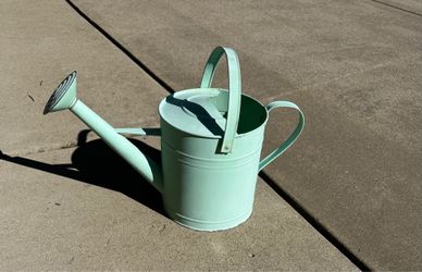 Metal watering can