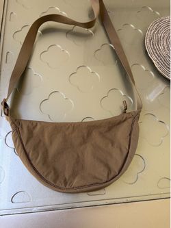 Uniqlo  new round  mini shoulder  bag for men