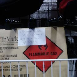 Tri mark propane stove with 12 bottles of propane