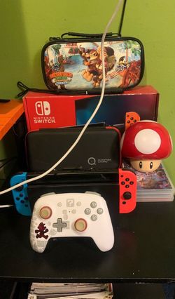 Nintendo Switch Console Bundle Includes Controller, Games, Cases, and Mushroom!