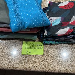 😀10 womens pants and one blouse large and xtra large😀