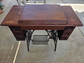 Antique red eye singer sewing table