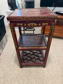 antique Chinese red lacquer and gilded tiered side table