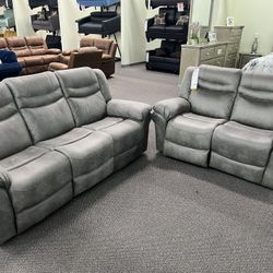 New Reclining Couch  / Love Seat .  Grey Breathable Leatherette .  Free Delivery !