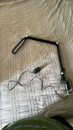 Adjustable clamp style desk or table lamp