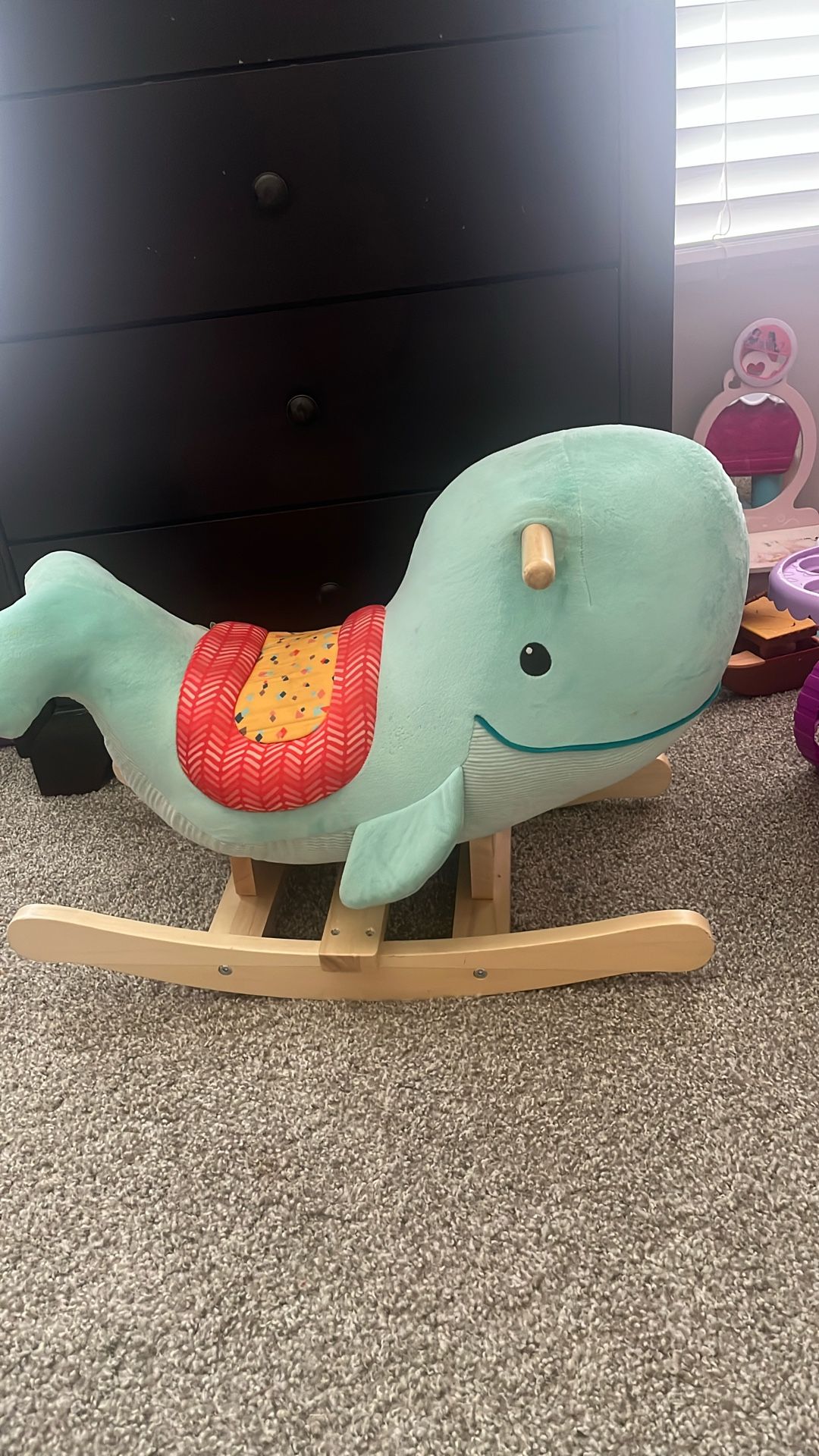 Kids rocking whale