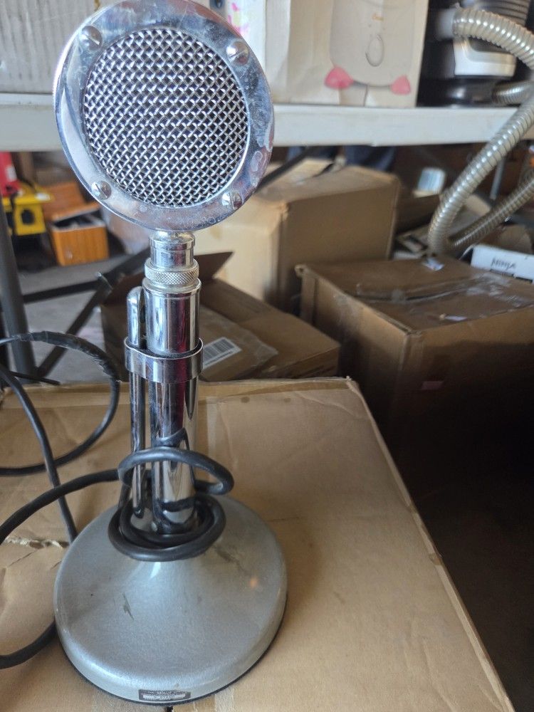 vintage Astatic D-104 microphone with a stand,
