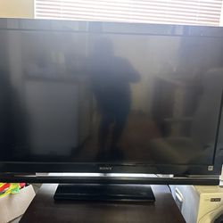Sony Bravia 55 tv with small stand table 
