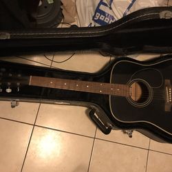 Jasmine acoustic guitar with case