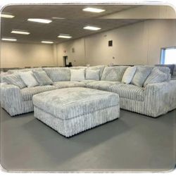 Stupendous Alloy 3 Piece Sectional & Ottoman 