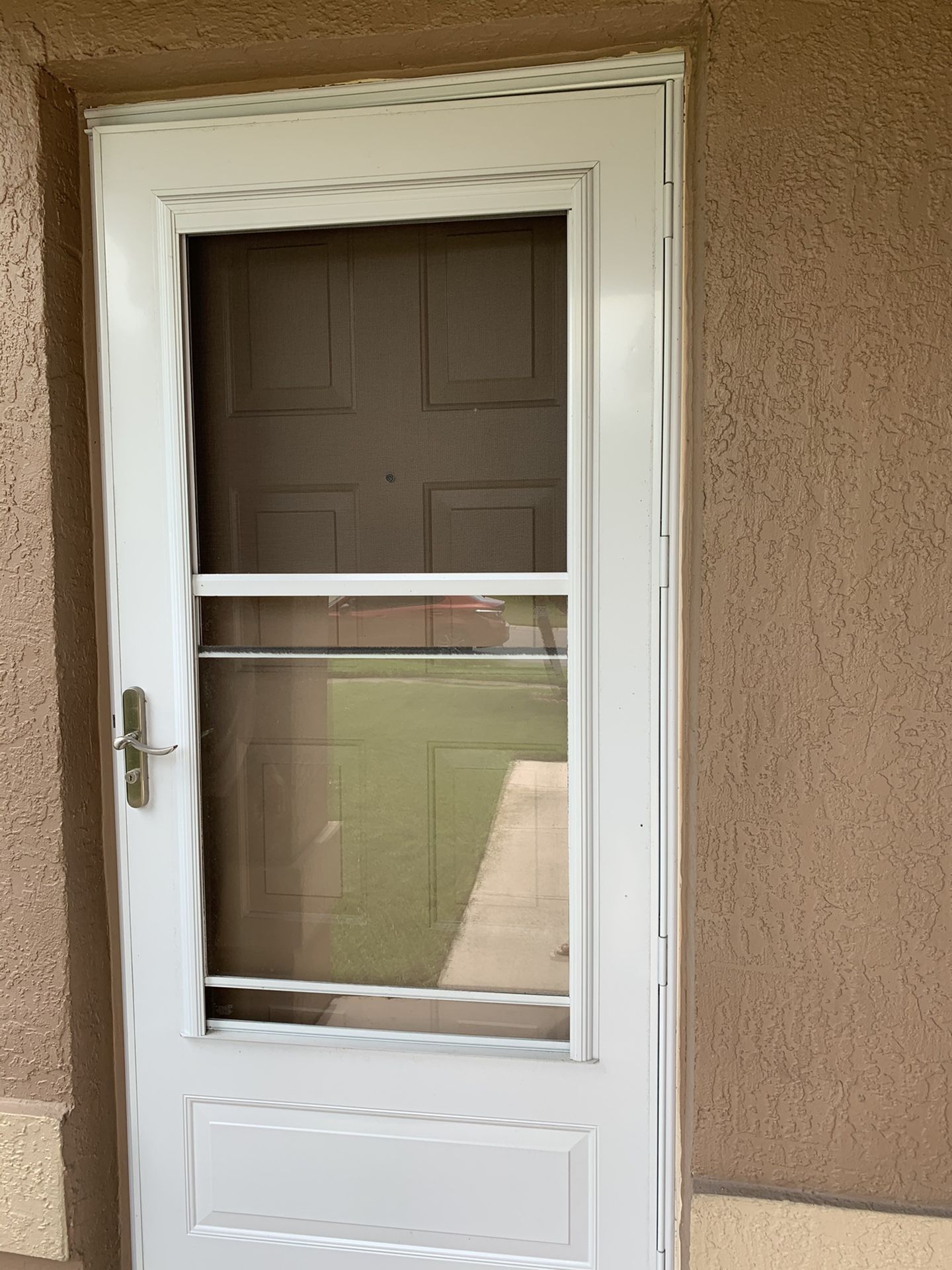 Storm door with build in screen 36 inch by 80 for Sale in Kissimmee, FL