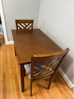 Dining table with two chairs