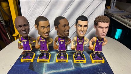 Lamar Odom (#7), Caron Butler (#1), Kobe Bryant (#8), Chris Mihm (#31), and Luke Walton (#4), which appear to be from the 2004–2005 Carl's Jr. Collect