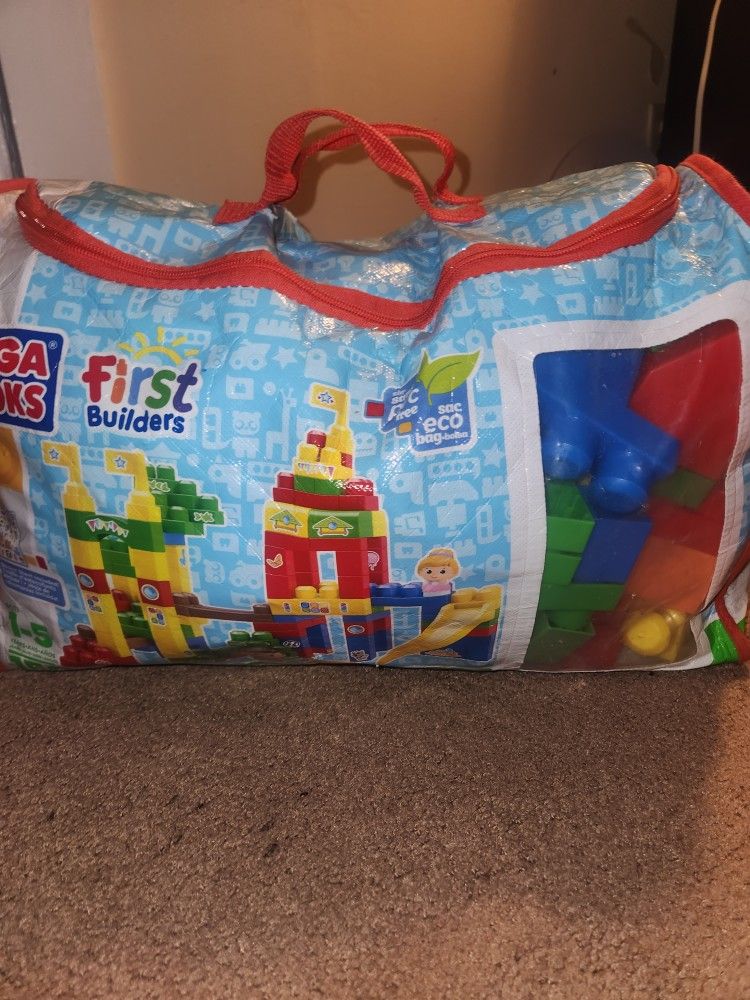 Mega Bloks ( 100 Plus Bloks With Wheelbarrow) 