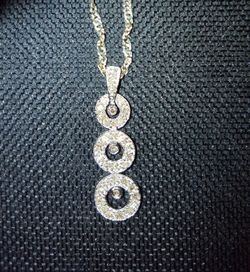 This is a Beautiful Forever Diamond and Silver Necklace chain 18 inches twisted look to give more bling