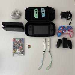 Nintendo Switch W/ 2 Games (Manhattan Pickup W 110 ST)
