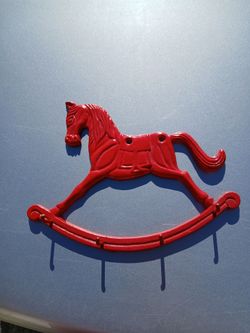 Metal rocking horse wall hanging