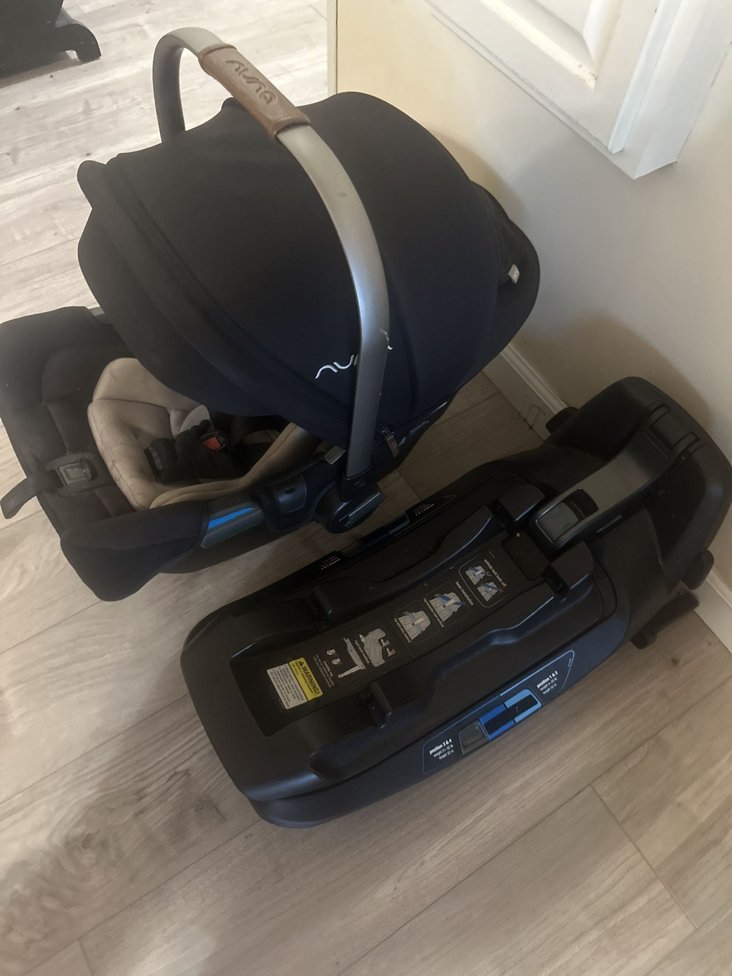 Nuna Pipa Rx Car Seat and Car Adapter