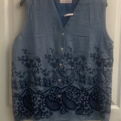 Brand new Ladies blue embroidered top size L