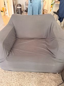 Black Armchair with gray fabric covering