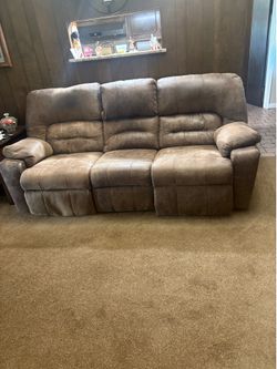 Power reclining  sofa and matching power recliner  chair with USB plug.