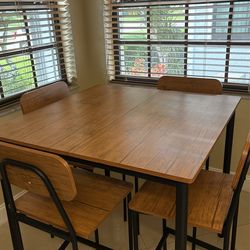 Table and four chairs looks brand new