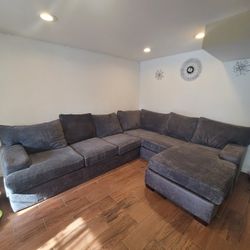 Grey Sectional  Taking Offers