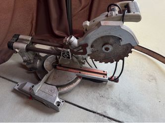 Wood cutter with sliding laser