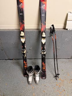 Used Rossignol boys ski plate, binding, boots and pole set