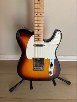 2007 Fender standard MIM telecaster electric guitar sunburst.