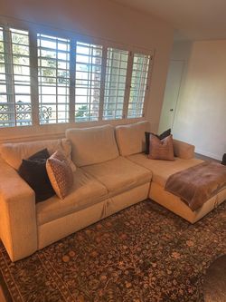 Living spaces Sebastian Cream White Beige Fabric 111" 2 Piece Convertible Futon Sleeper Sectional