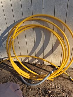 20-30 feet 1" underground gas line w/riser
