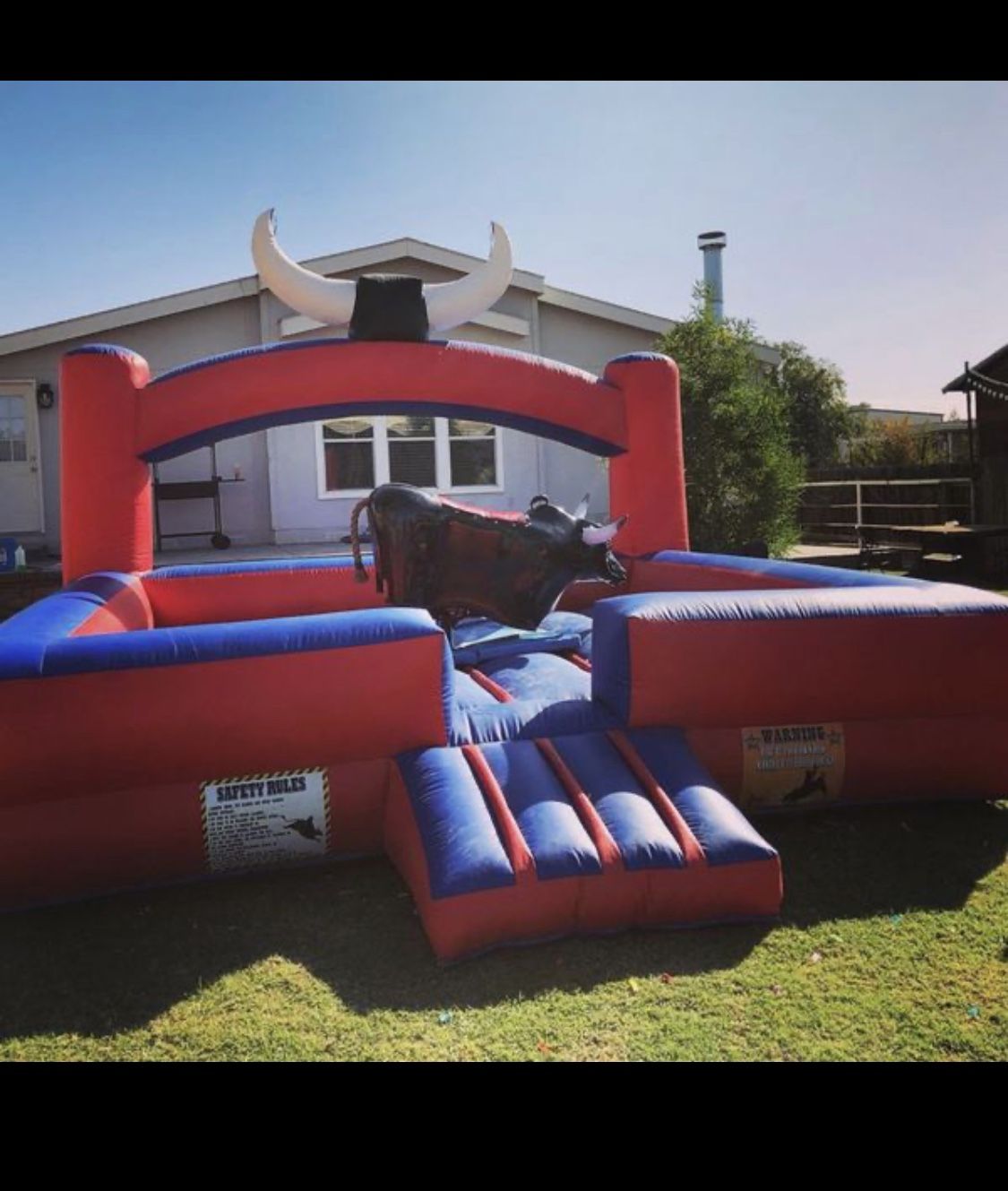 Dual motor mechanical bull with trailer