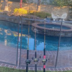 THREE Penn Saltwater Fishing Reels with Sabre & UGLY STICK Tiger Fishing rod.