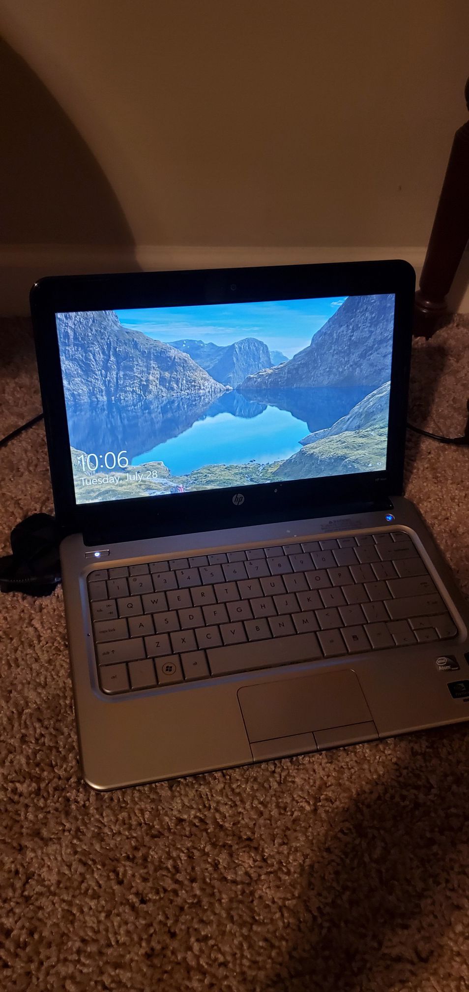 HP Mini Laptop - 11.5 screen/ Standard Programs - Works perfectly while plugged in. Price is firm.