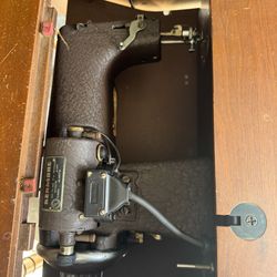 Antique sewing machine and table