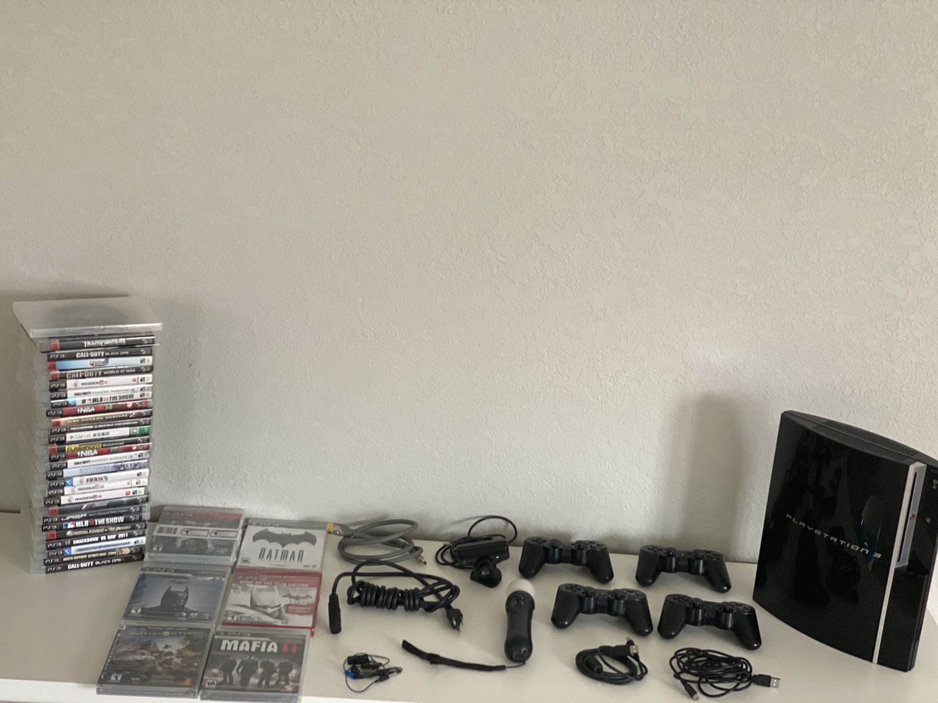 PlayStation 3 with games controllers and more