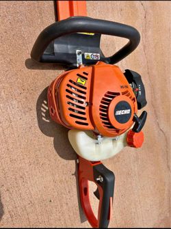 Echo gas powered hedge tremor